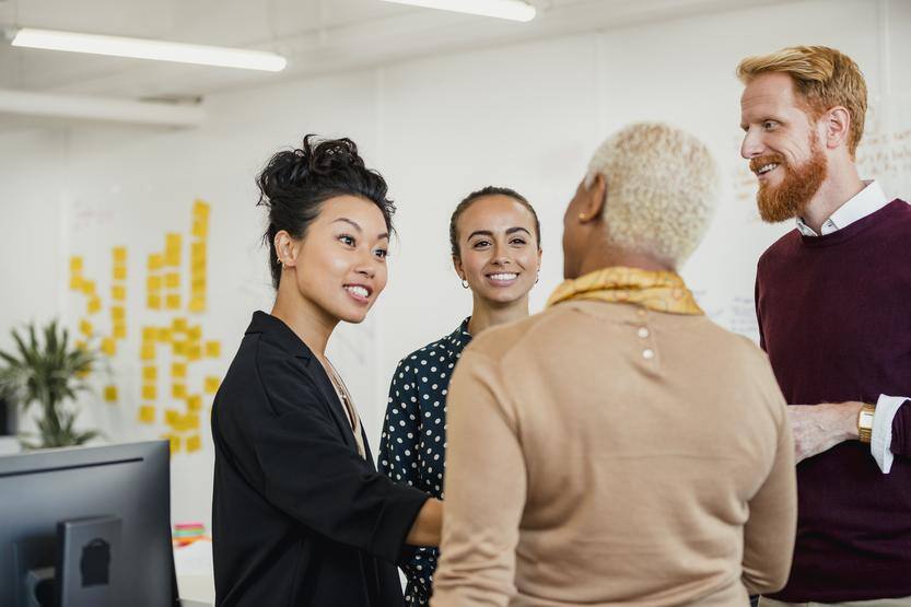 Group talking in corporate office